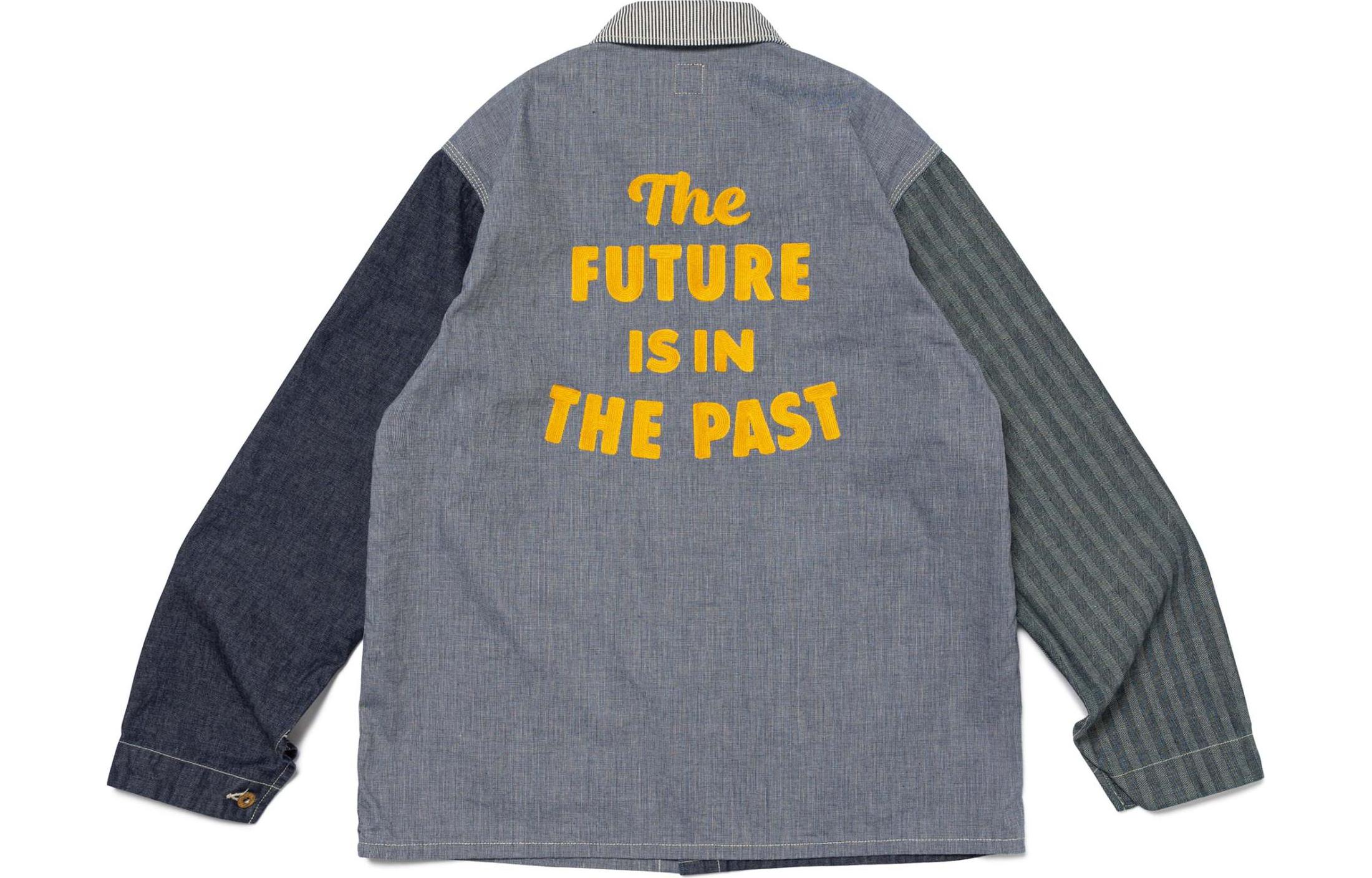 Lookbook HUMAN MADE SS24 Jaket Crazy Coverall Indigo Unisex Desain Tombol Slogan. HM27JK012