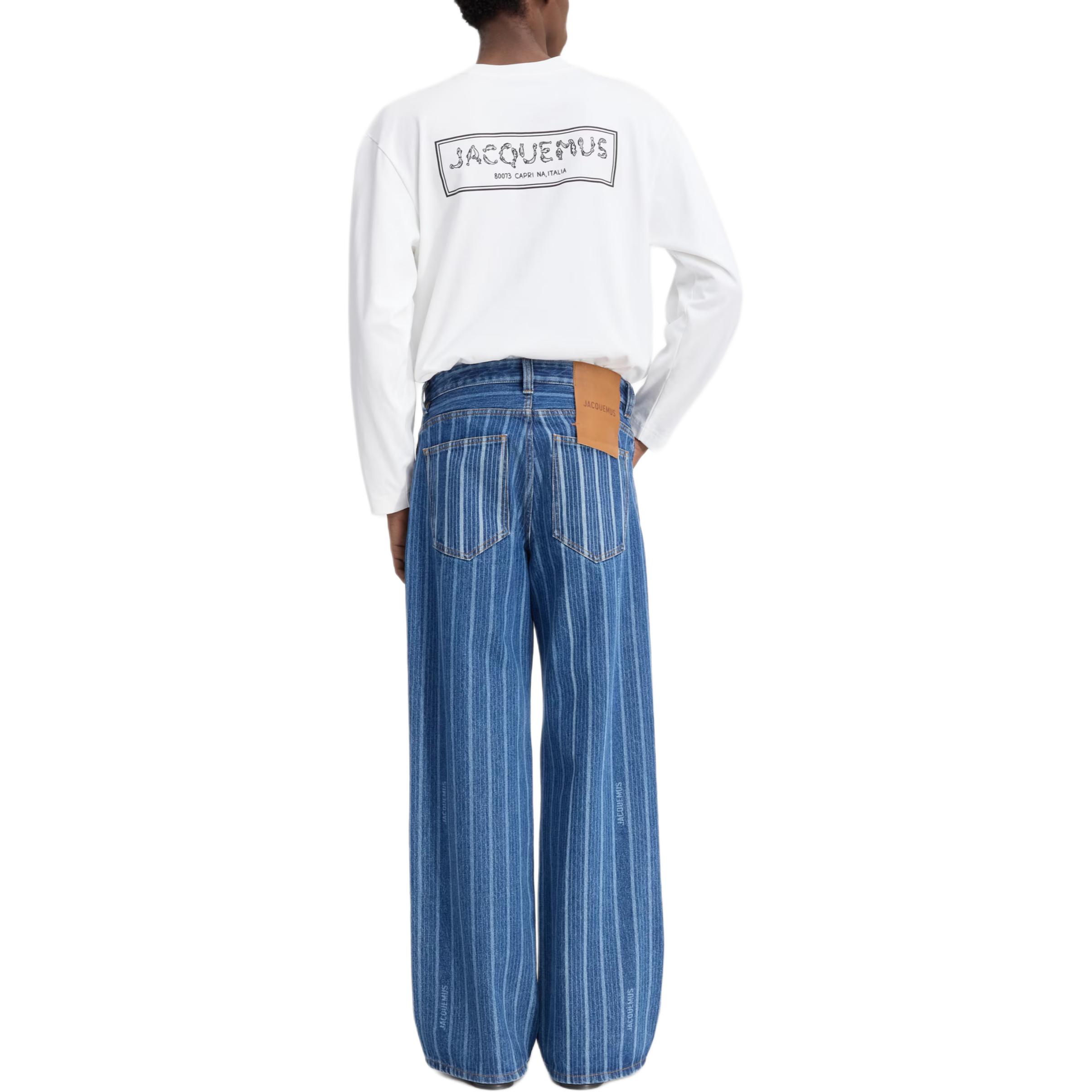 Shop Jacquemus FW24 Jeans Pria Biru Pudar Garis-Garis Model Baggy Mid-Rise. 245DE038-1513-3FF