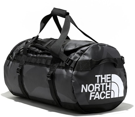KAWS x The North Face Basecamp Duffel 'Black' Order KAWS x The North Face Basecamp Duffel 'Black'