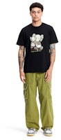 KAWS x Uniqlo UT Kaos Grafis Lengan Pendek Hitam 467775 Order KAWS x Uniqlo UT Kaos Grafis Lengan Pendek Hitam 467775