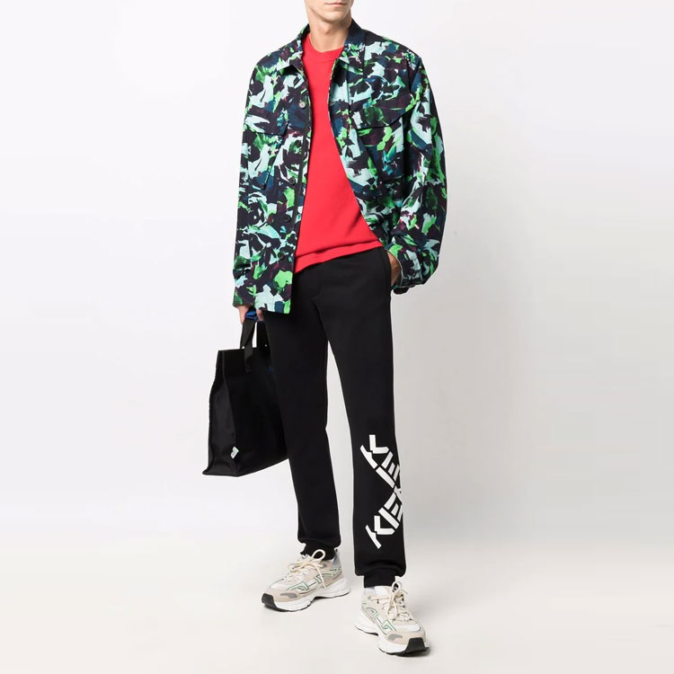 Shop KENZO 細身中腰休閒長褲 黑色十字標誌設計運動褲 FB65PA7174MS-99