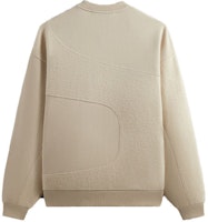 KITH FW23 弧形拼接男女同款米色套头毛衣卫衣。 KHM031531-262 Lookbook KITH FW23 弧形拼接男女同款米色套头毛衣卫衣。 KHM031531-262