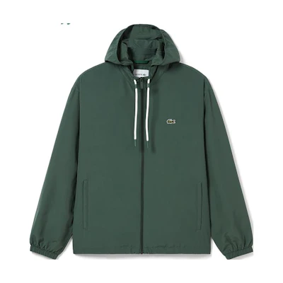 LACOSTE FW23 Solid Zip-Up Hooded Jacket in Cypress Green. BH6291-SMI