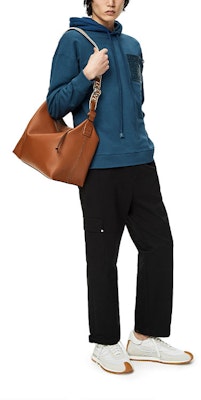 LOEWE FW22 Men’s Oversized Pullover Hoodie with Logo Patch in Petrol Blue. H526Y25X15-1200 Lookbook LOEWE FW22 Men’s Oversized Pullover Hoodie with Logo Patch in Petrol Blue. H526Y25X15-1200