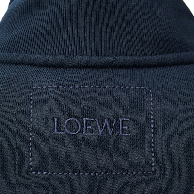 LOEWE FW24 High-Neck Loose-Fit Embroidered Logo Sweatshirt Navy Blue. H526Y24X44-5120 Details for LOEWE FW24 High-Neck Loose-Fit Embroidered Logo Sweatshirt Navy Blue. H526Y24X44-5120