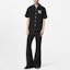 Lookbook LOUIS VUITTON FW24 Black Polo Shirt with Embroidered Letter Logo. 1AFWTU