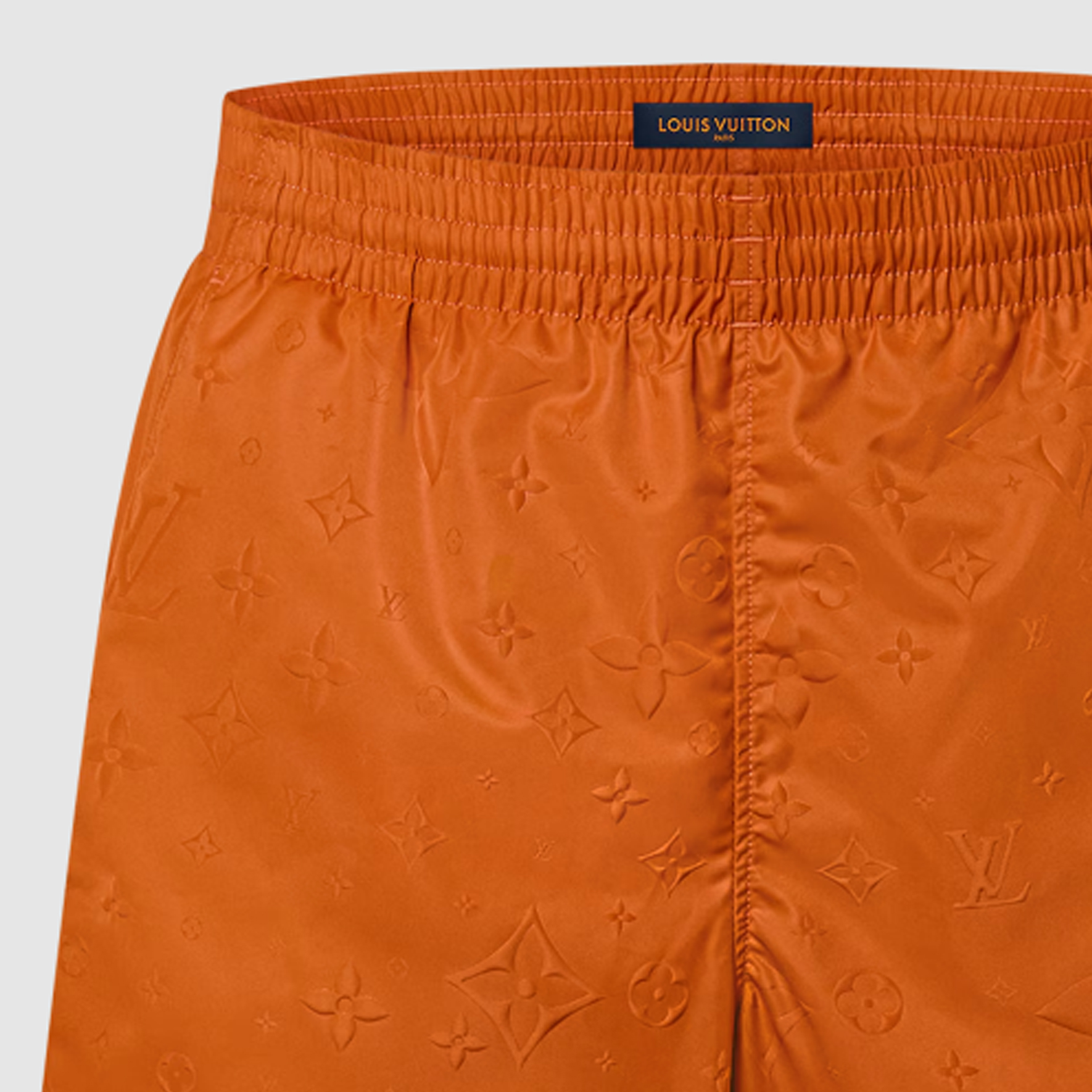 Lookbook LOUIS VUITTON Pantalones Cortos de Natación Naranja con Logo Relieve. 1AFQ75