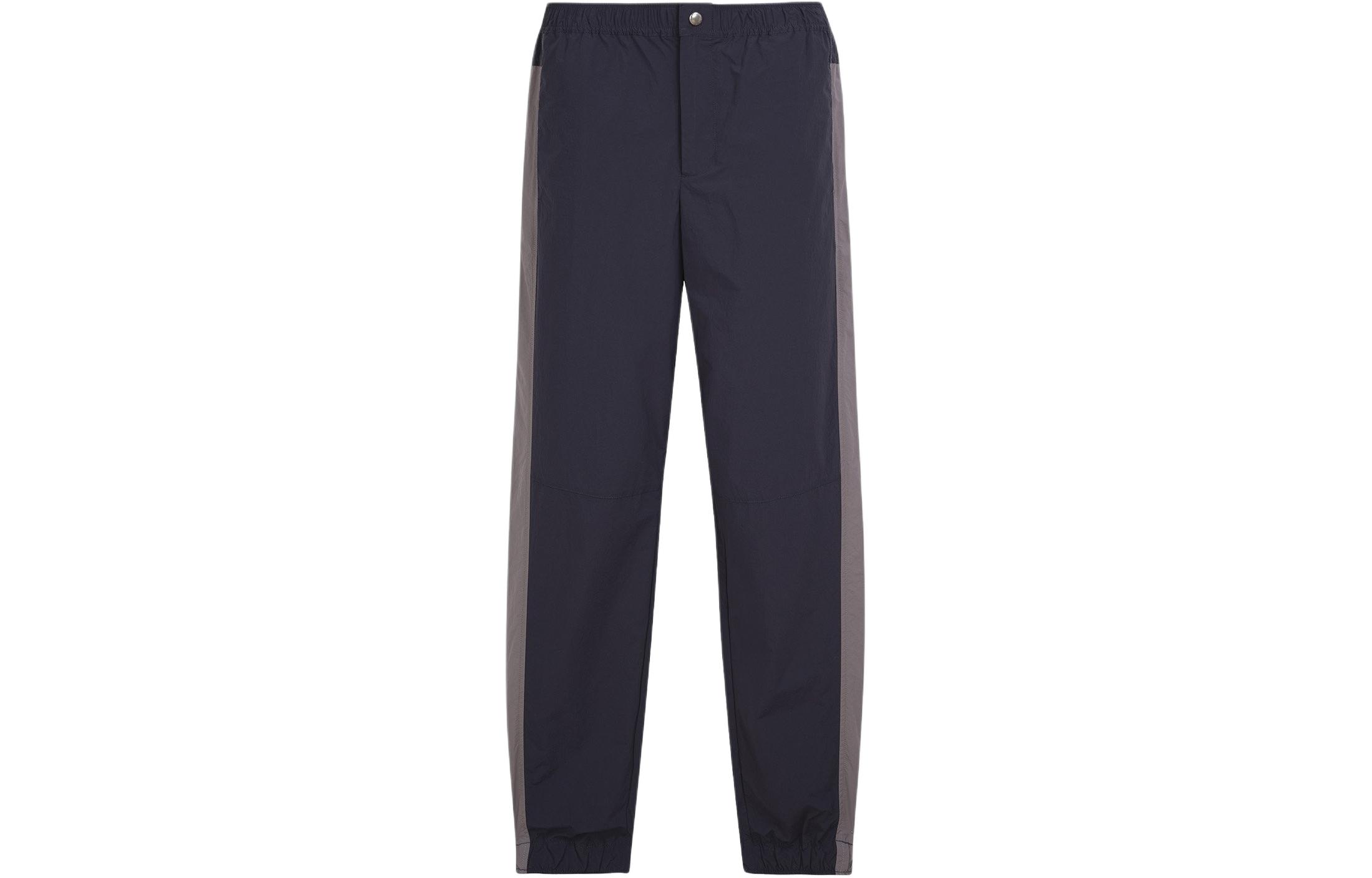 Maison Kitsune SS24  Navy Side-Striped Track Pants with Zip Pockets. MM01101WQ0072-P480