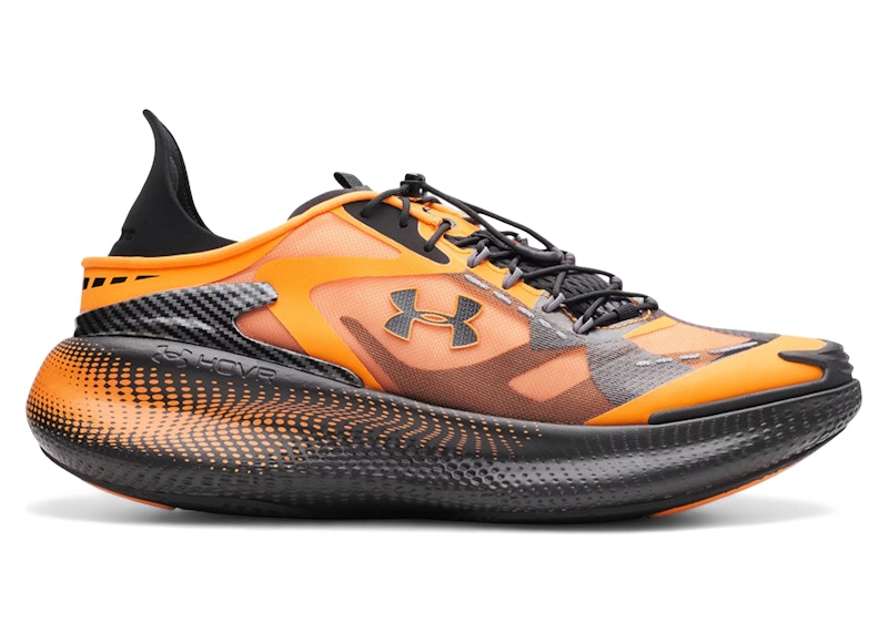 orange and black under armour cleats