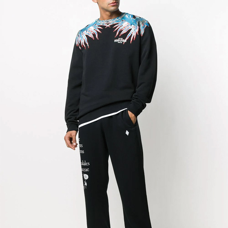 Purchase Sudadera Negra Marcelo Burlon con Estampado Caracol de Mar. CMBA009F20FLE0061040