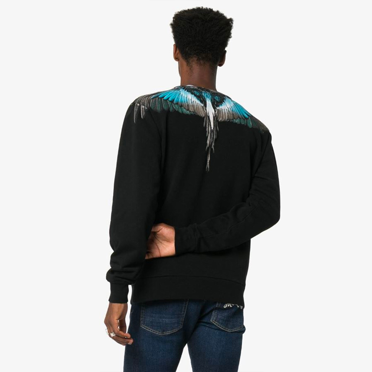 Purchase Sudadera Negra Marcelo Burlon AW19 con Diseño de Alas Azul Hielo. CMBA009E196300091088