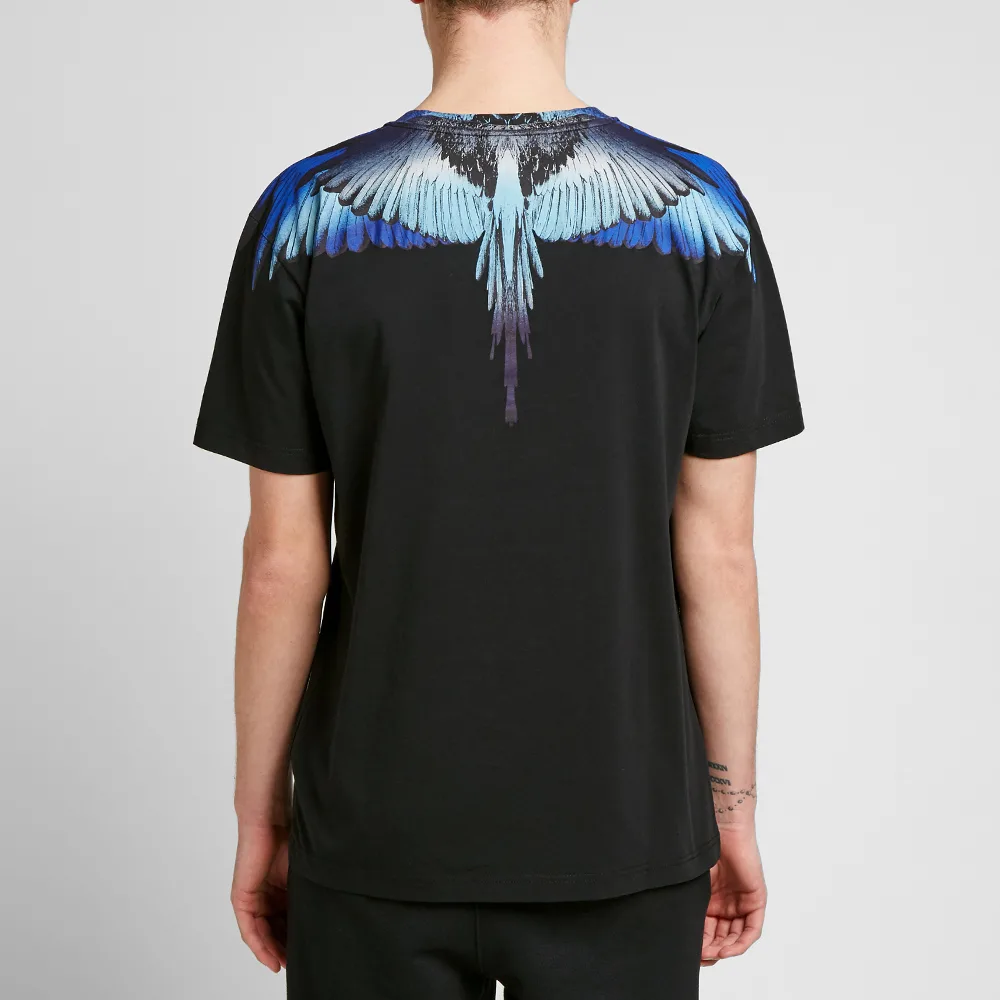 Shop Marcelo Burlon Kaos Hitam Gradient Blue Wings Print. CMAA018S190010211088