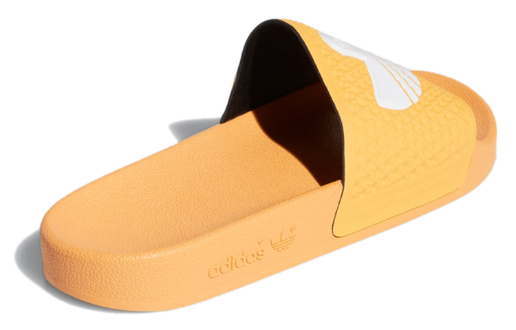 Shop adidas originals Shmoofoil Slide 一字拖鞋 男女皆宜 黃白