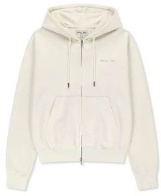 Matin Kim Back Logo Essential Zip-Up Hoodie in Ivory MK2600JP303VIV Buy Matin Kim Back Logo Essential Zip-Up Hoodie in Ivory MK2600JP303VIV