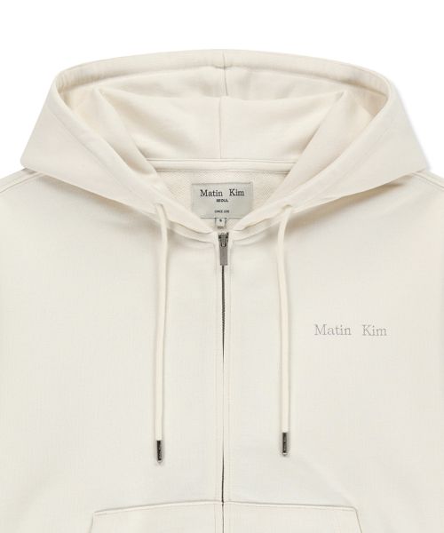 Lookbook Matin Kim Back Logo Essential Zip-Up Hoodie in Ivory MK2600JP303VIV
