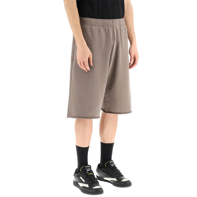 Purchase MM6 Maison Margiela SS23  Brown Letter Print Knit Sweat Shorts. S52MU0093S25337-816