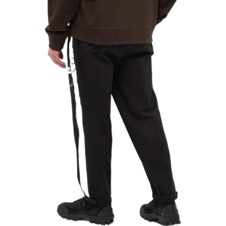 Shop 몽클레어 사이드 스트라이프 로고 프린트 루즈핏 캐주얼 팬츠. G20912A00023595LU999