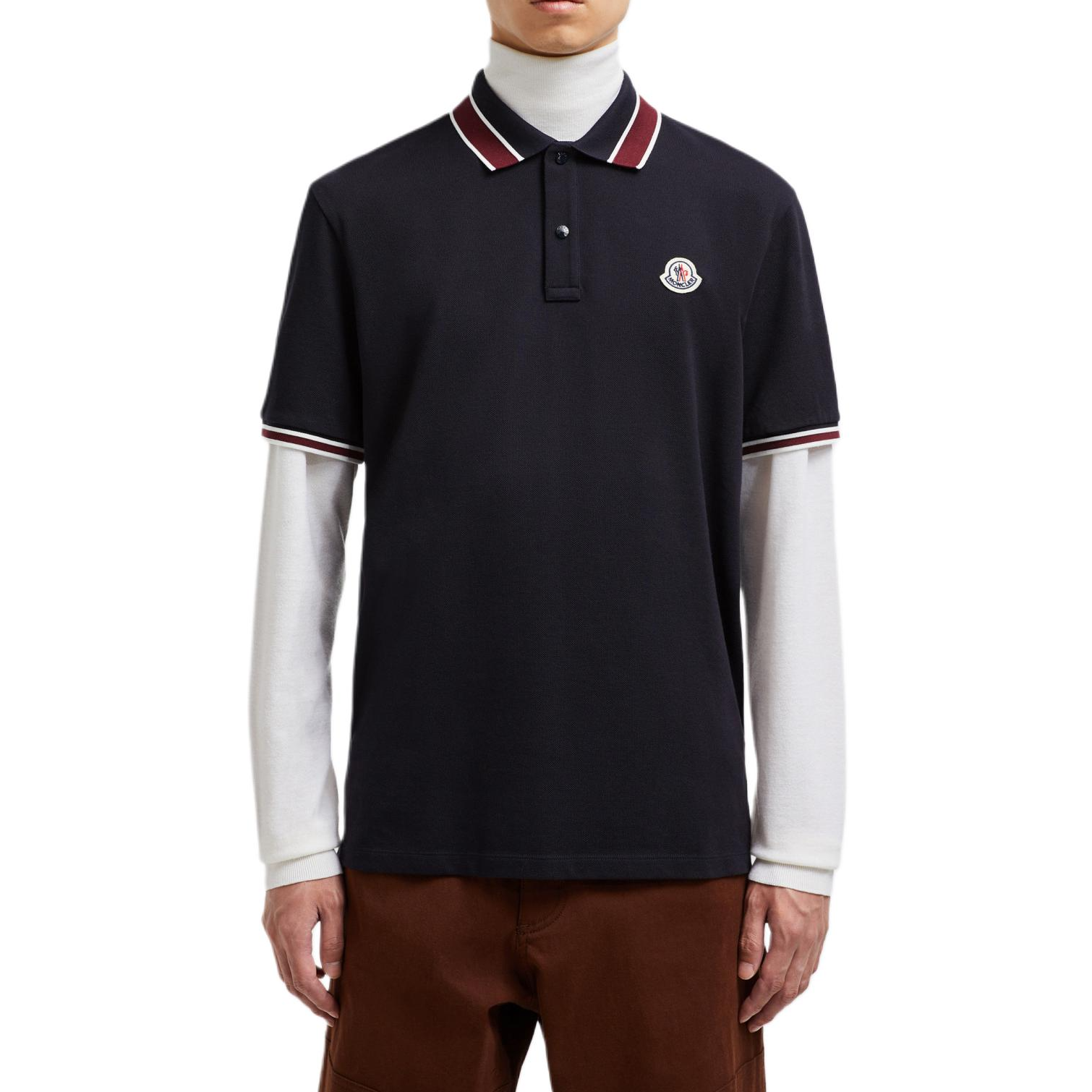 Shop Polo de manga corta de rayas Moncler Logo Patch algodón azul marino. J20918A0001889A1677X
