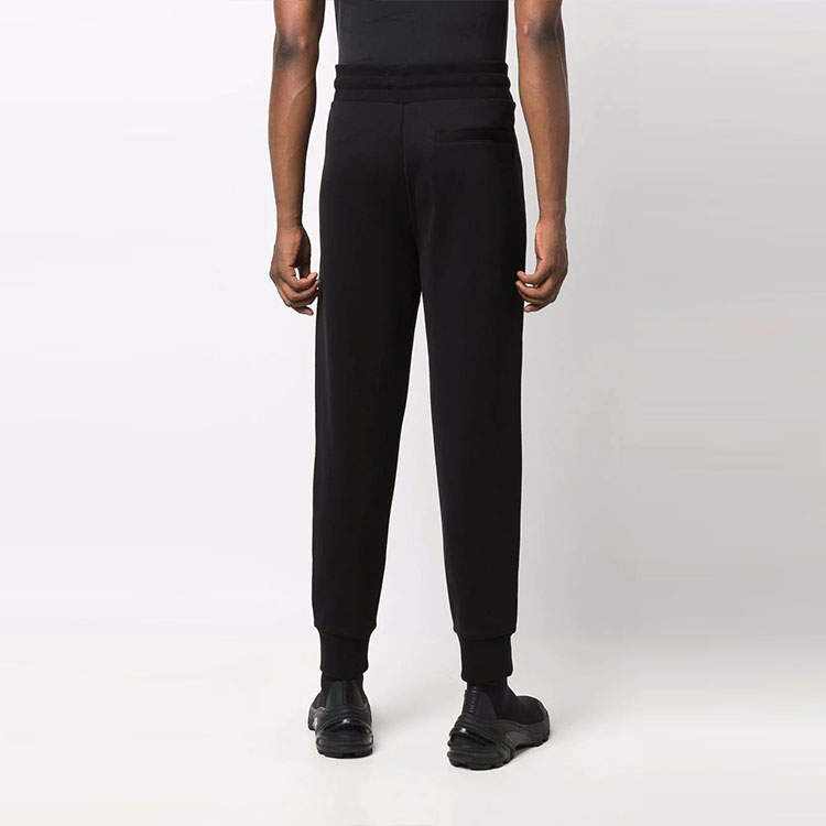 Shop Moncler Solid Tapered Knit Joggers with Graphic Print. G20918H00002809KR