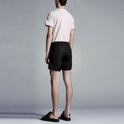 Moncler SS21 Black Nylon Swim Shorts with Side Stripes. G10912C7070053326999 Purchase Moncler SS21 Black Nylon Swim Shorts with Side Stripes. G10912C7070053326999