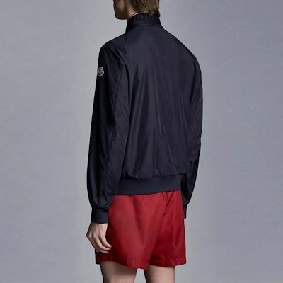 Moncler SS22 Blue Waterproof Jacket with Solid Logo Patch. H10911A0007868352775 Purchase Moncler SS22 Blue Waterproof Jacket with Solid Logo Patch. H10911A0007868352775