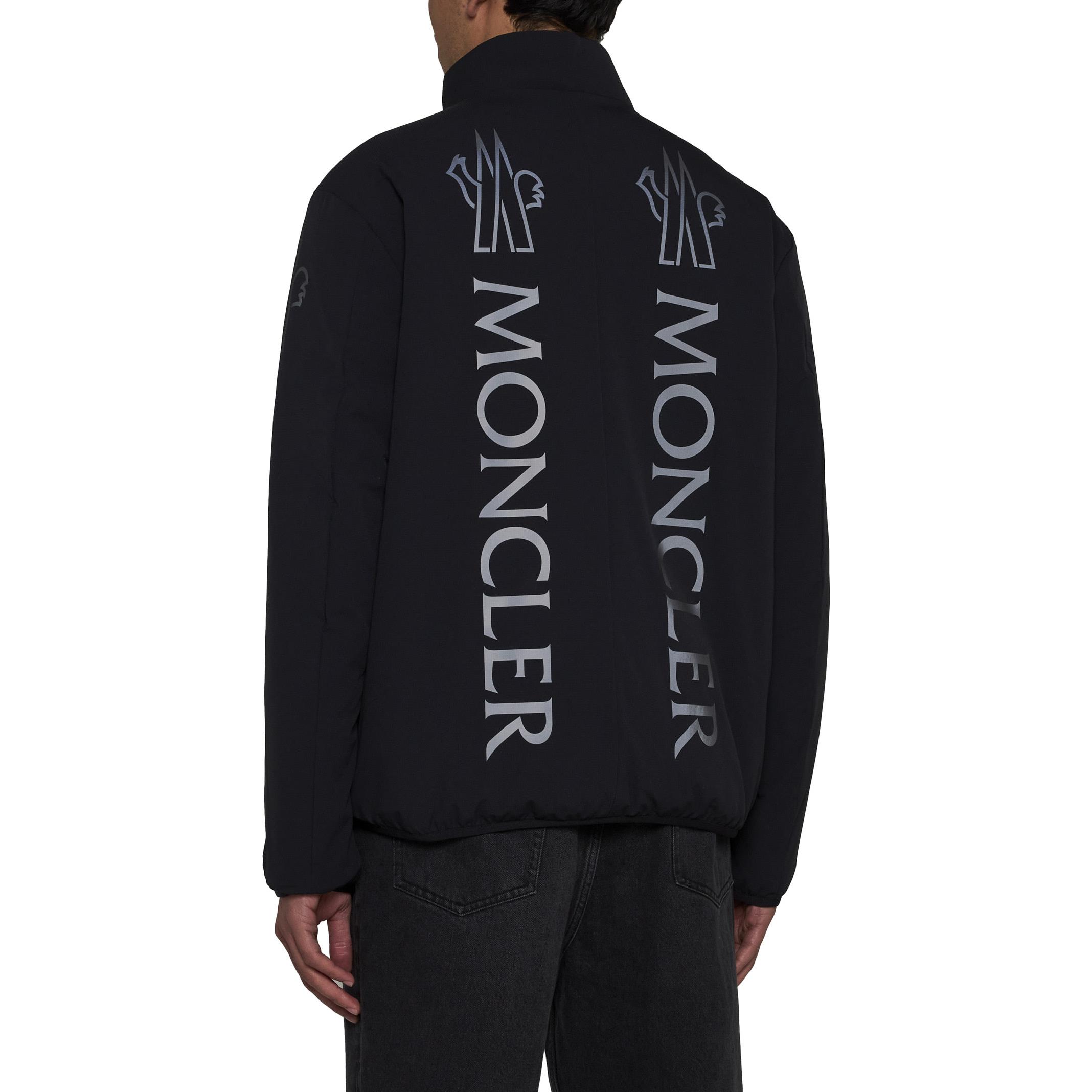 Purchase Moncler SS24  Black Loose-Fit Puffer Jacket with Lettered Zip and Stand Collar 1A00052U597EN999