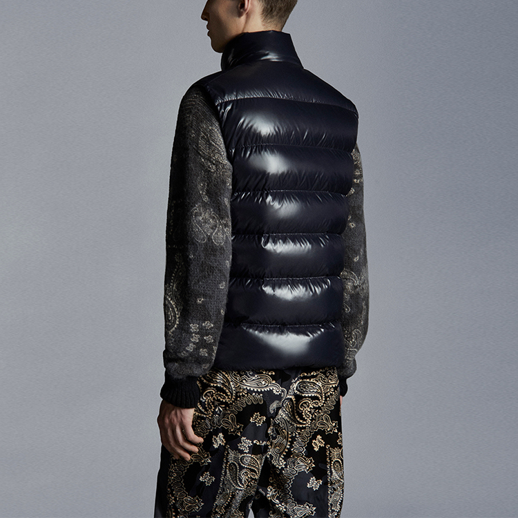 Shop Moncler Tibb Quilted Nylon Down Vest Unisex in Dark Blue. G20911A0009668950742