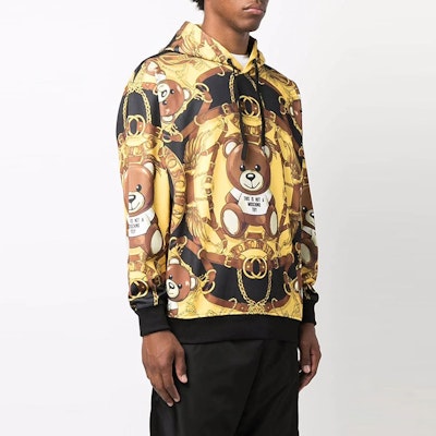 MOSCHINO FW21 Baju Kuning Pullover dengan Cetakan Kartun Beruang Teddy. J1722-5229-1555 Purchase MOSCHINO FW21 Baju Kuning Pullover dengan Cetakan Kartun Beruang Teddy. J1722-5229-1555