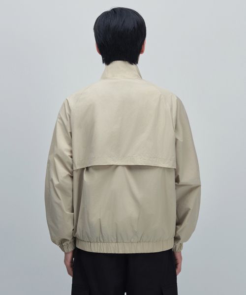 Lookbook Musinsa Standard Oversized High-Neck Windbreaker Jacket [Light Beige] MMDJJ5Z01-LB