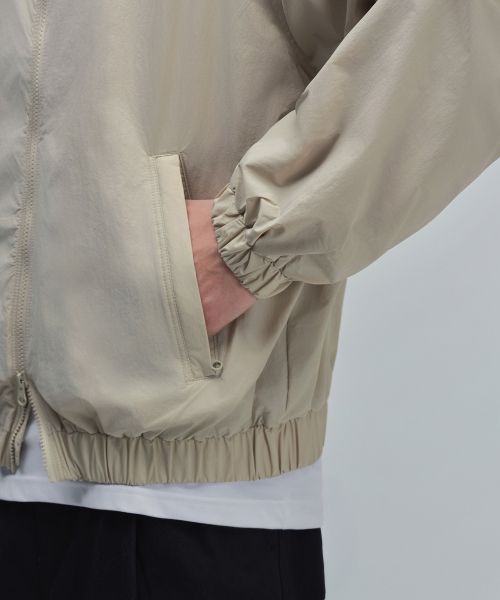 Details for Musinsa Standard Oversized High-Neck Windbreaker Jacket [Light Beige] MMDJJ5Z01-LB