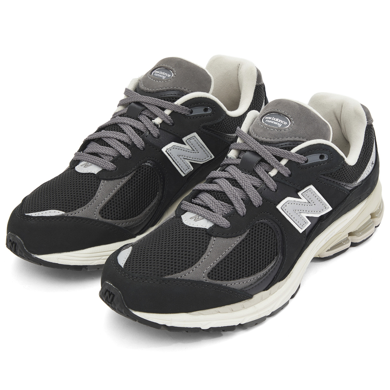 Shop New Balance 2002R Schwarz Castlerock M2002RNC