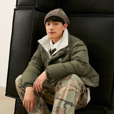 New Balance Lightweight Puffer Jacket Unisex Dark Green/White Adjustable Hem. AMJ44301-DRC Details for New Balance Lightweight Puffer Jacket Unisex Dark Green/White Adjustable Hem. AMJ44301-DRC