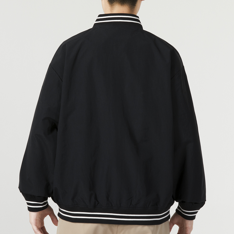 Purchase New Balance Jaket Hitam Longgar Logo Printed Woven AMJ33362-BK