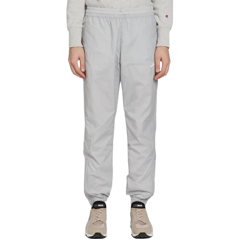 Shop Nike 中腰針織運動褲 灰色拉鍊口袋 AJ2300-012