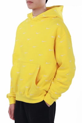 Nike All Over Swoosh Logo Hoodie Yellow Shop Nike All Over Swoosh Logo Hoodie Yellow