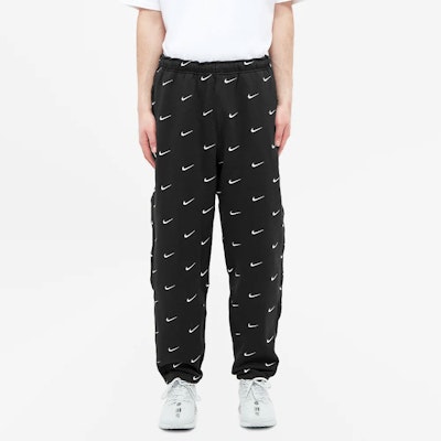 Nike All Over Swoosh Logo Pants Black Order Nike All Over Swoosh Logo Pants Black