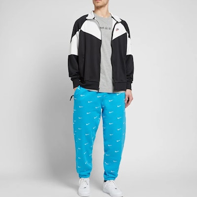 Nike All Over Swoosh Logo Pants Blue Order Nike All Over Swoosh Logo Pants Blue