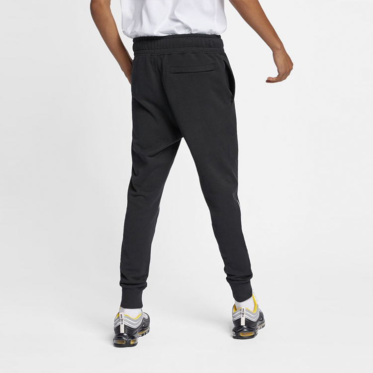 Shop Nike 大勾復古針織運動長褲 黑/白 AR3087-010