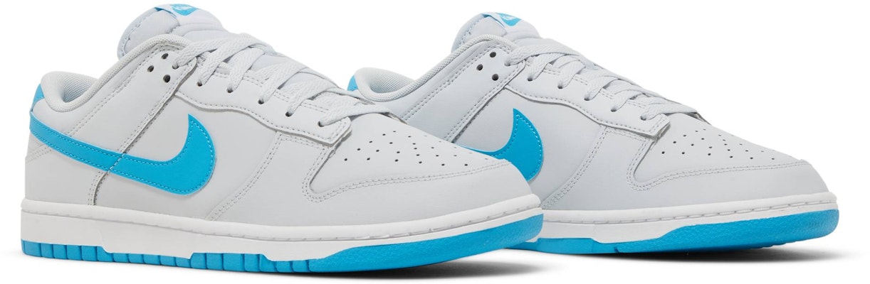 White nikes with blue 2025 swoosh