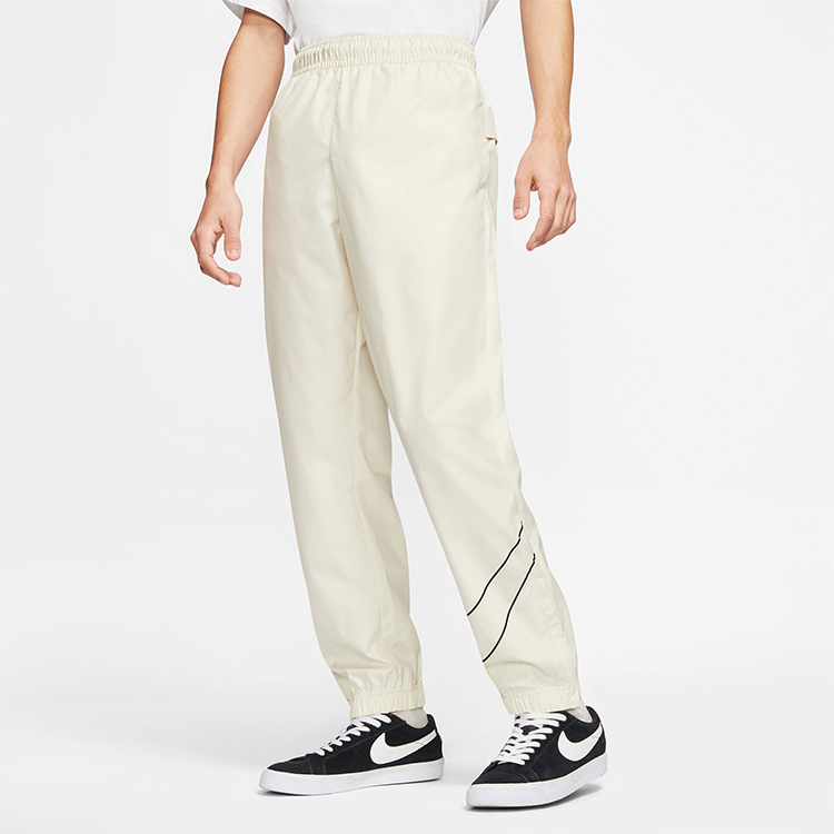 Shop Nike SB 大勾標滑板褲 化石灰 CI7231-238