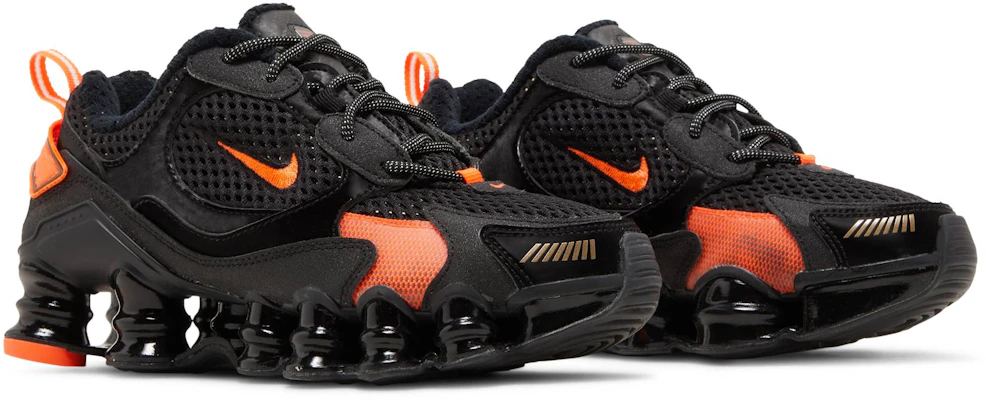Black and orange nike shox hotsell