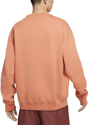 Nike Solid Fleece Crewneck Sweatshirt Soft Orange DA0318-863 Lookbook Nike Solid Fleece Crewneck Sweatshirt Soft Orange DA0318-863