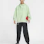 Shop Nike 綠色防風連帽風衣外套 FQ3063-376