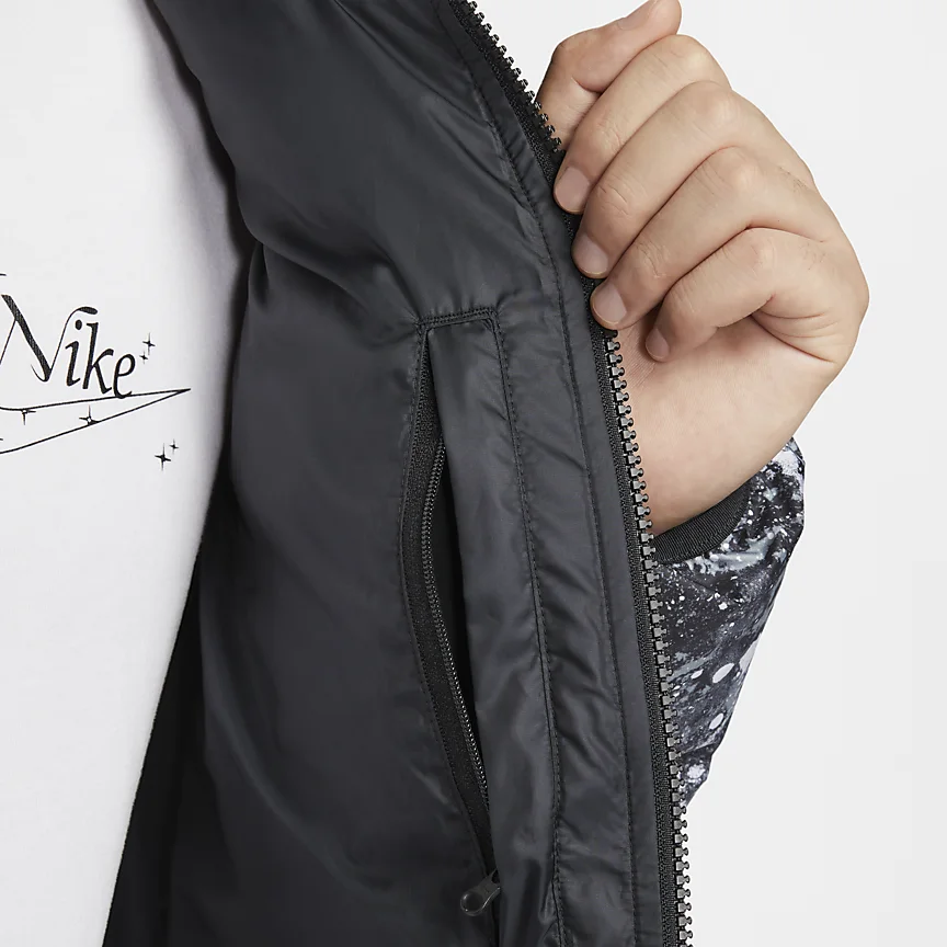 Sizing Chaqueta Nike Storm-FIT Windrunner Negra Impermeable y Cortavientos con Capucha. HQ4184-010