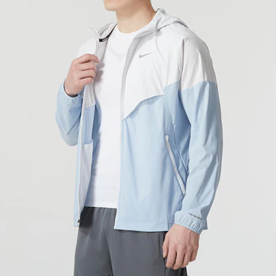 Chaqueta con Capucha Nike Windrunner Logo Colorblock Azul Claro FB7541-094 Purchase Chaqueta con Capucha Nike Windrunner Logo Colorblock Azul Claro FB7541-094