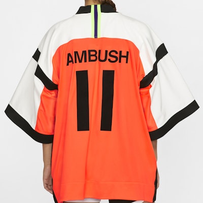 Nike x Ambush Top Numbering Jacket White/Orange Shop Nike x Ambush Top Numbering Jacket White/Orange