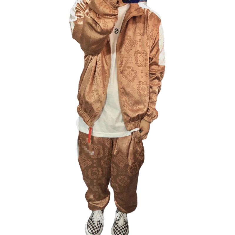 Shop Nike x CLOT 玫瑰金絲綢圖案運動長褲 粉色聯名款 CT4088-605