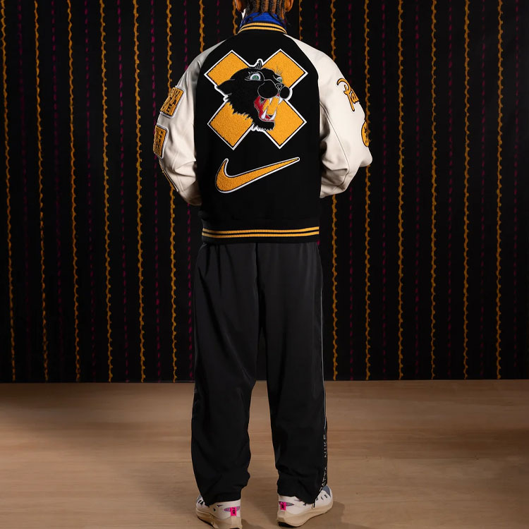 Purchase Nike x Patta Running Team SS24 Jaket Varsiti Hitam Putih Unisex. FJ3106-010