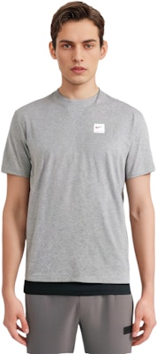 Nike x Pigalle T-Shirt Dark Grey Heather/Sail Sizing Nike x Pigalle T-Shirt Dark Grey Heather/Sail