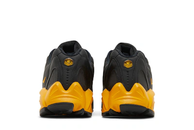 NOCTA x Nike Hot Step Air Terra 'Black University Gold'